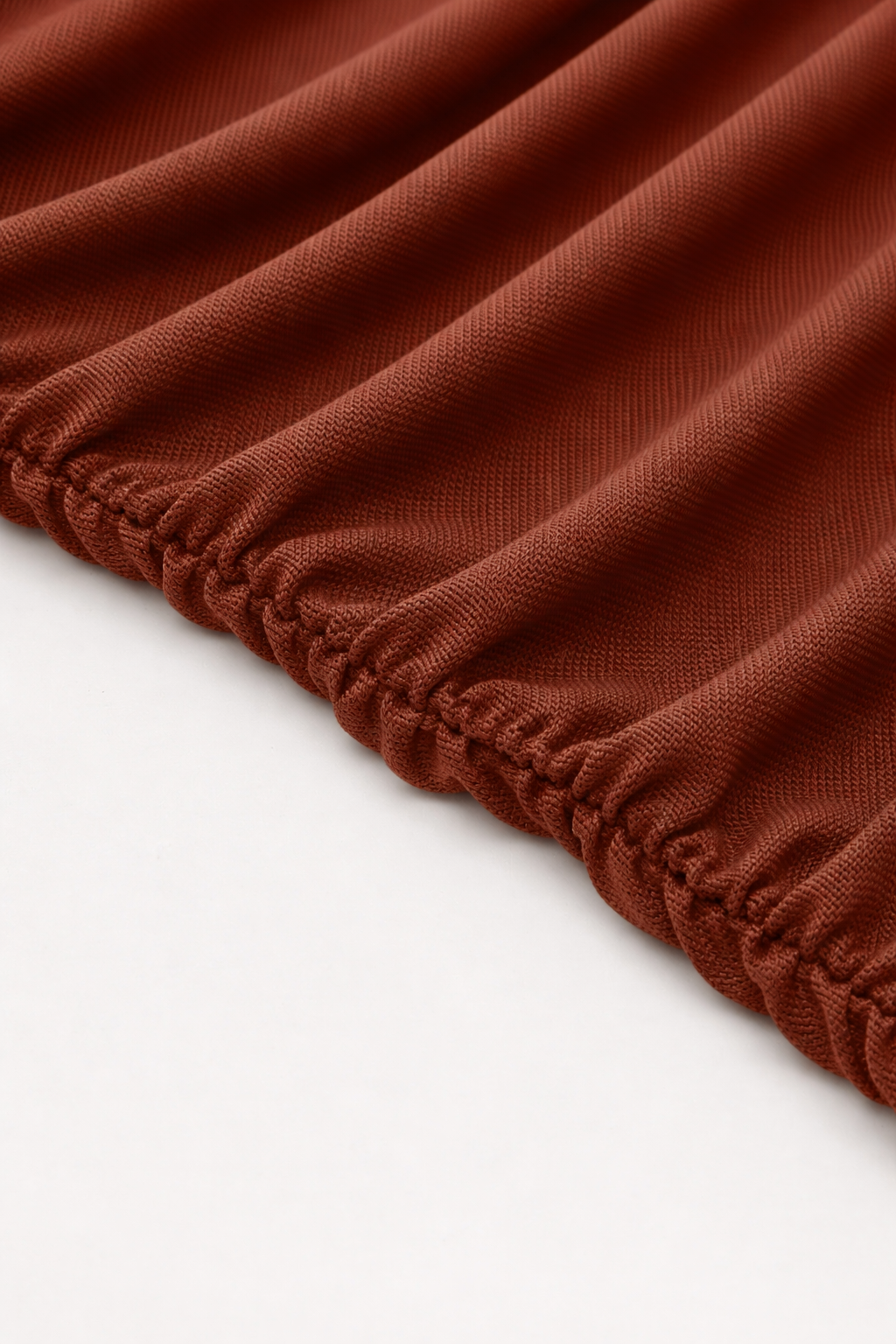 Close-up of a brown fabric with a white background
