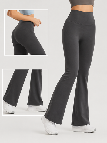 Dark gray flared pants worn by a person on a light gray background