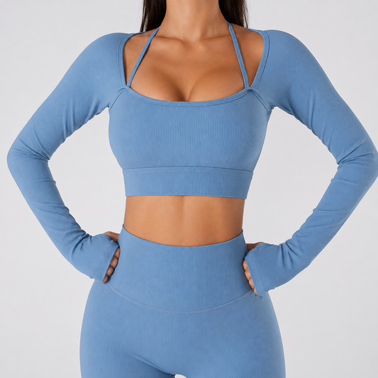 Person wearing a blue athletic outfit on a plain background