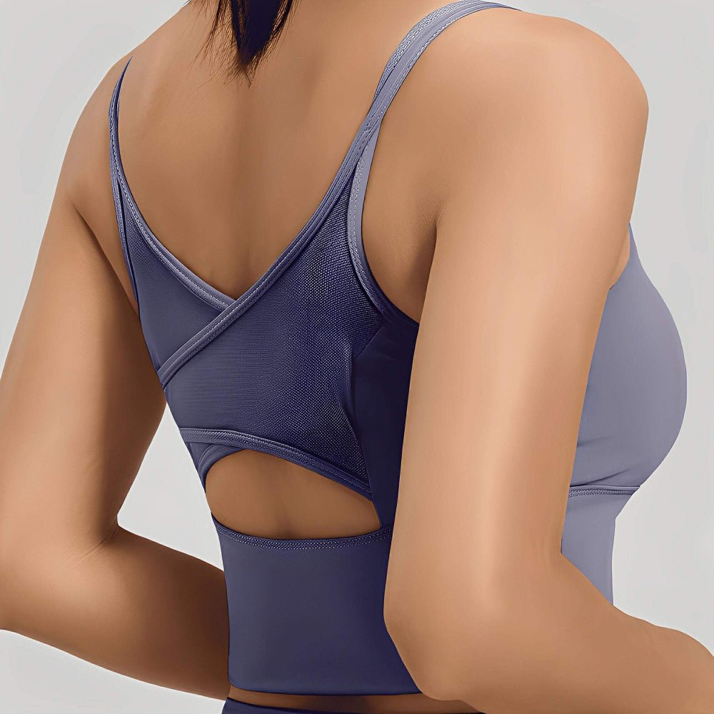 Person wearing a blue athletic outfit on a plain background